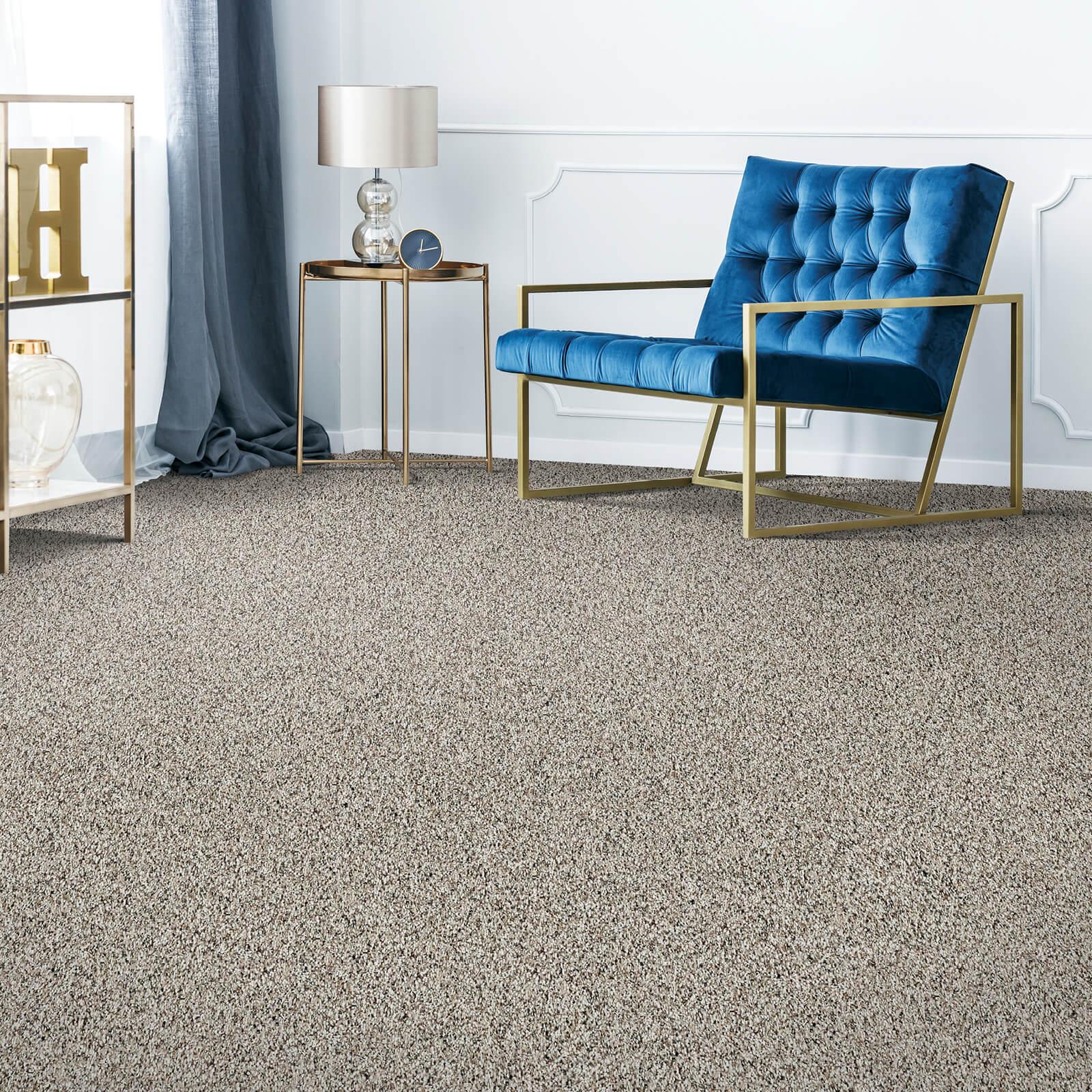 Carpet flooring with blue couch | The Carpet Gallery